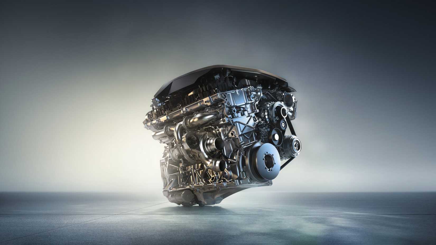 Motor BMW B58, primer plano del bloque sobre fondo estilizado